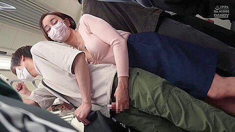 A Horny Mature Woman Who Seduces Her Handsome Boyfriend With A Sticky Handjob From Behind, Even Though Her Girlfriend Is Right Next To Her